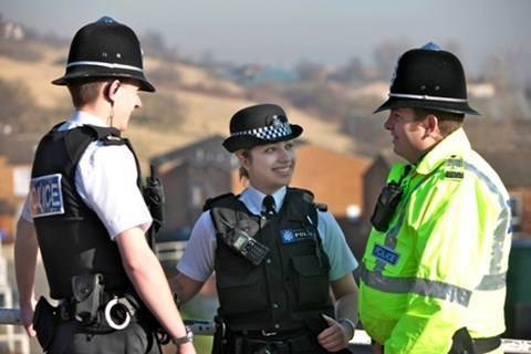 Three police officers talking together