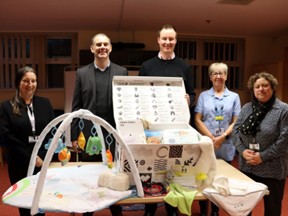 Staff with a rotherham baby pack